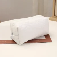 Valge meigitarvete kott